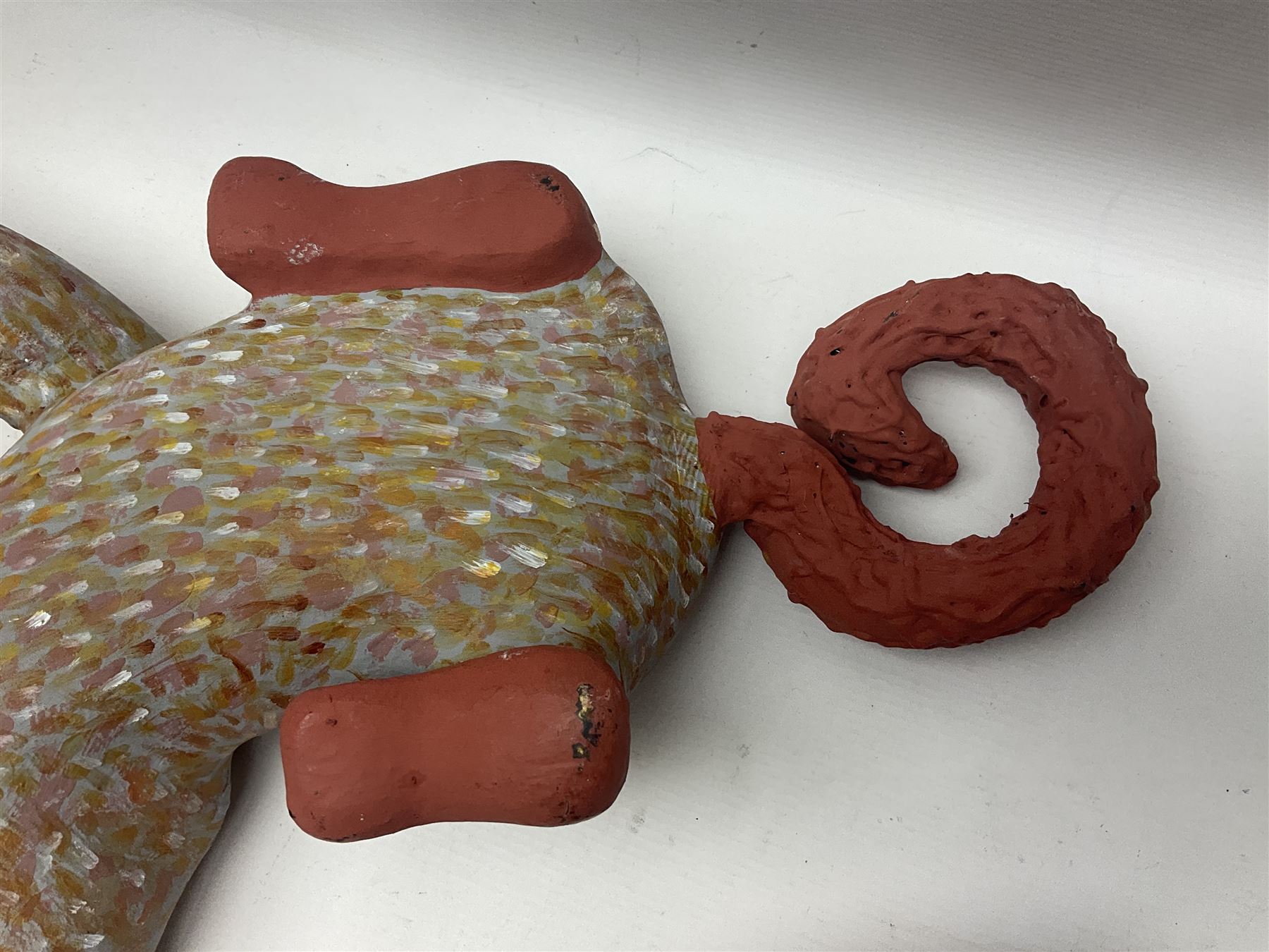 Helen Skelton (British 1933 – 2023): Two carved wooden abstract sculptures, one modelled as a dog, the other modelled as a bear, both with painted stippled decoration, largest H20cm. Born into an RAF family in 1933 in Kent and travelled the world extensively during her childhood. After settling in Bridlington, Helen immersed herself in painting, textiles, and wood sculpture, often inspired by nature's beauty. Her talent was showcased in a one-woman show at Sewerby Hall and recognised with the sculpture prize at Ferens Art Gallery in 2000. Sadly, Helen’s daughter passed away from cancer in 2005. This loss inspired Helen to donate her sculptures to Marie Curie upon her passing in 2023.