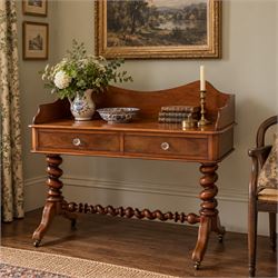 Victorian mahogany washstand with raised three-quarter back, fitted with two frieze drawer...