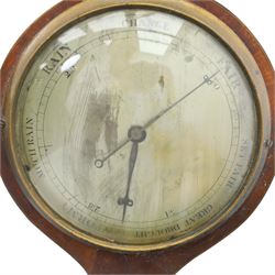 Three wheel barometers, a mother of pearl inlaid mahogany case, swan neck pediment, thermometer and circular dial, H 92cm, the second Sheraton Revival style with floral inlay, swan neck pediment, thermometer and circular dial, H 102cm, the third Sheraton Revival style, H 95cm (3)