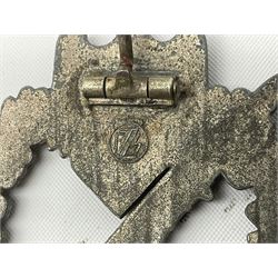 Three WW2 German badges comprising Blockade Runner War Badge and Coastal Artillery badge, both marked 'Fec Otto Placzec Berlin'; and Infantry Assault Badge; all with fixing pins (3)