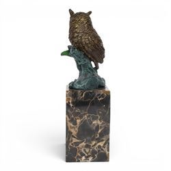 Cold painted bronze figure, modelled as an owl perched upon a tree stump signed Milo and with foundry mark, raised upon black veined marble plinth, H27.5cm