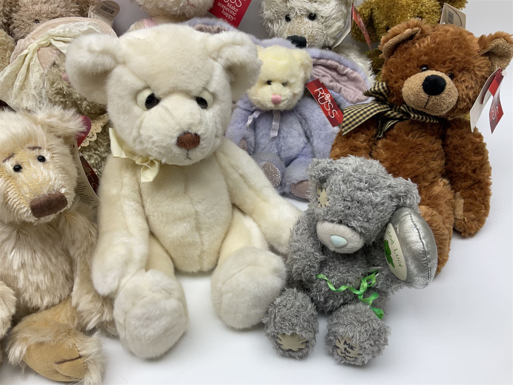 Eighteen Russ teddy bears including Ariella, Chloe, Spencer and Desmond,  mostly with tags, together with six other soft toys, tallest H42cm (24)