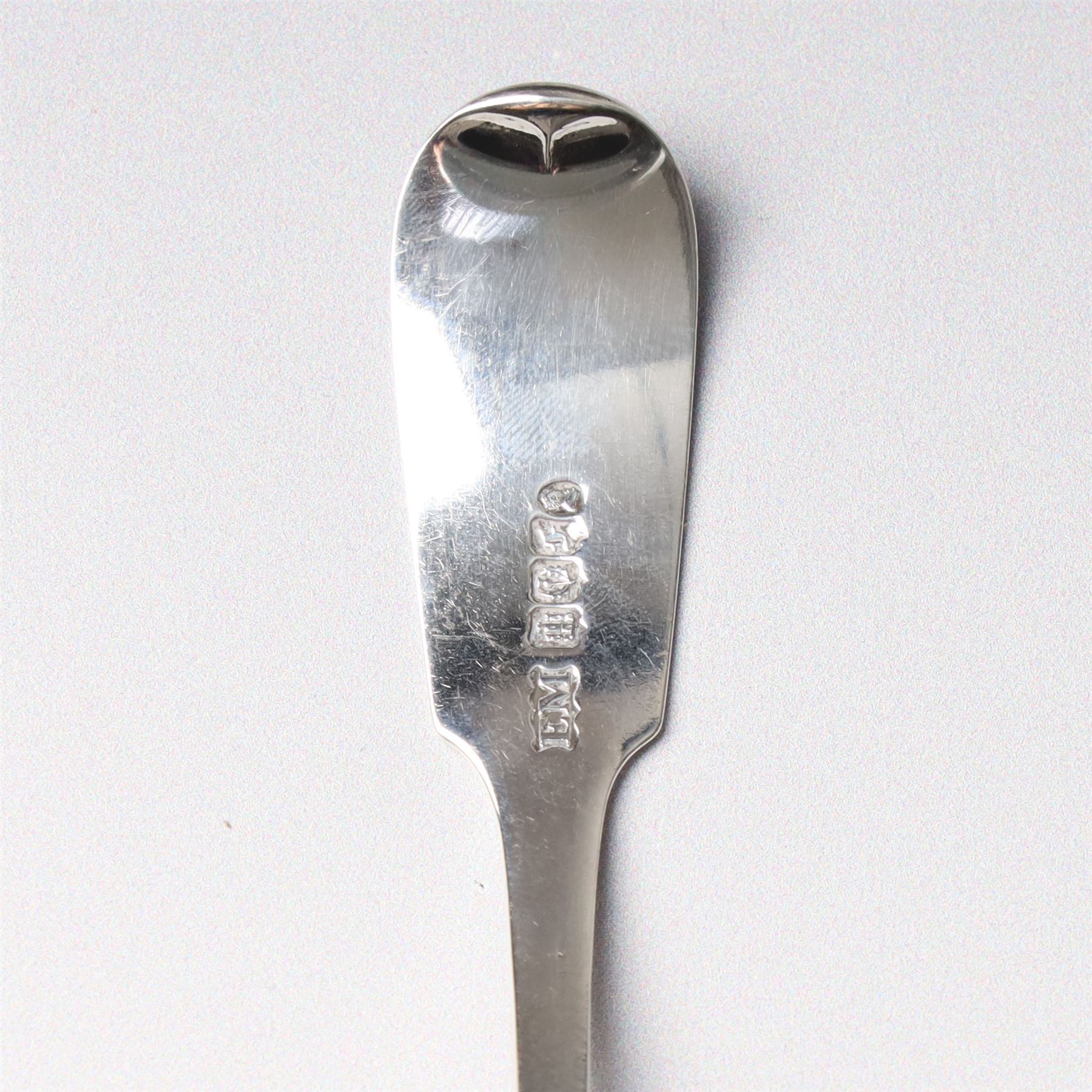 19th century Scottish silver fiddle pattern toddy ladle, Edinburgh 1837 Maker Millidge & Son, another Edinburgh 1835 Maker James McKay, George IV silver sauce ladle with fluted bowl London 1825 Maker Charles Eley and an Edwardian sauce ladle (4)