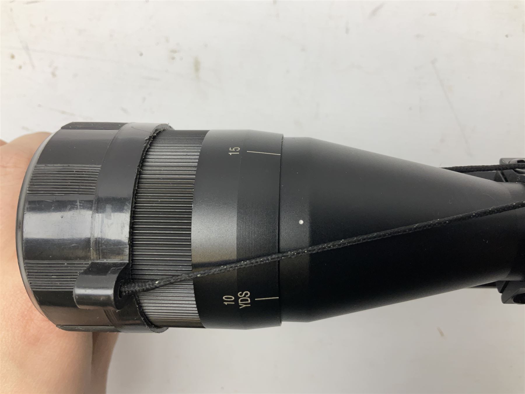 Stoegar .177 air rifle with break barrel action, 3 x 9 telescopic sight and fully integrated sound moderated barrel, no visible serial number, L109cm; in Stoeger lined gun sling