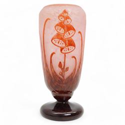 Le Verre Français, overlaid and etched cameo glass vase, circa 1920, internally mottled with pink and overlaid in amethyst with stylized floral decoration, the pedestal foot signed Le Verre Français, H26cm x D10.5cm 