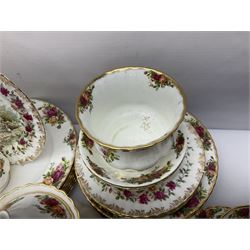 Royal Albert Old Country Roses pattern part tea and dinner service, including coffee pot, miniature teapot and stand, eight dinner plates, cake stand, sauce boat etc 