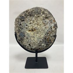 Large agate geode with quartz crystals to the centre, upon a metal stand, H35cm 