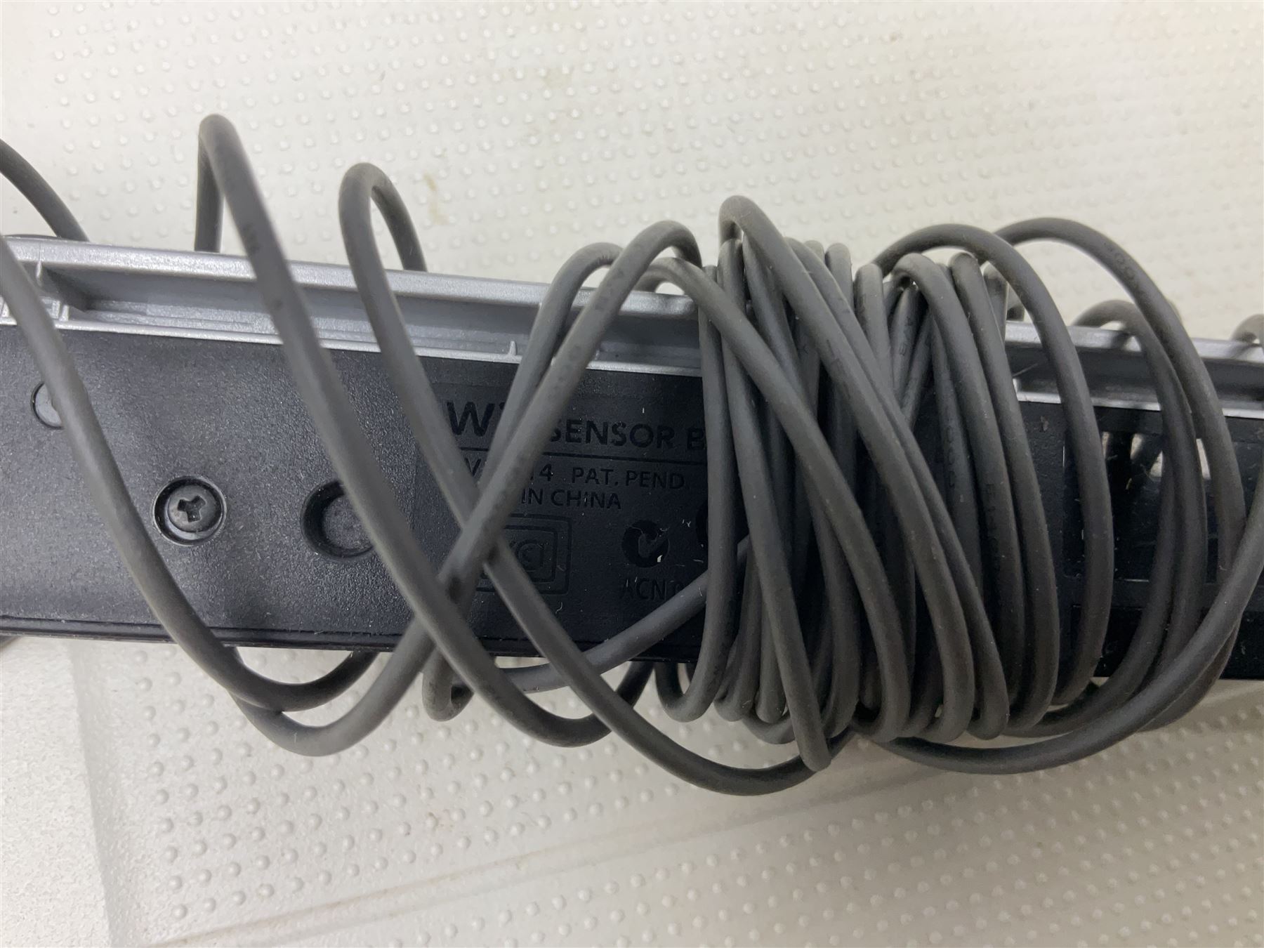 Nintendo Wii console, four controllers with cases and four nunchucks, Wii sensor bar, balance board and dance mat. Guitar hero wireless guitar for Wii and Redoctane wired guitar. Nintendo DS lite handheld gaming console, console and game cases and Guitar Hero Redoctane Guitar Grip. Selection of Nintendo Wii and Nintendo DS lite games to include Super Mario Galaxy, Guitar Hero, Wii Fit, Legend of Zelda games etc. Archos AV400 Series pocket video recorder with accessories, cradle and remote, in three boxes