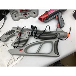 Mad Catz Dual Force Racing Wheel and Foot control for Playstation; Arcadia Image Projecting Game System; pair of Captain Scarlet and the Misterons phaser guns etc