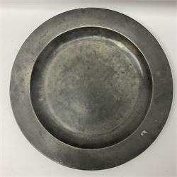 Group of seven 19th century pewter chargers, each of circular form with dished centre, two examples with touch marks verso, each approximately D39cm