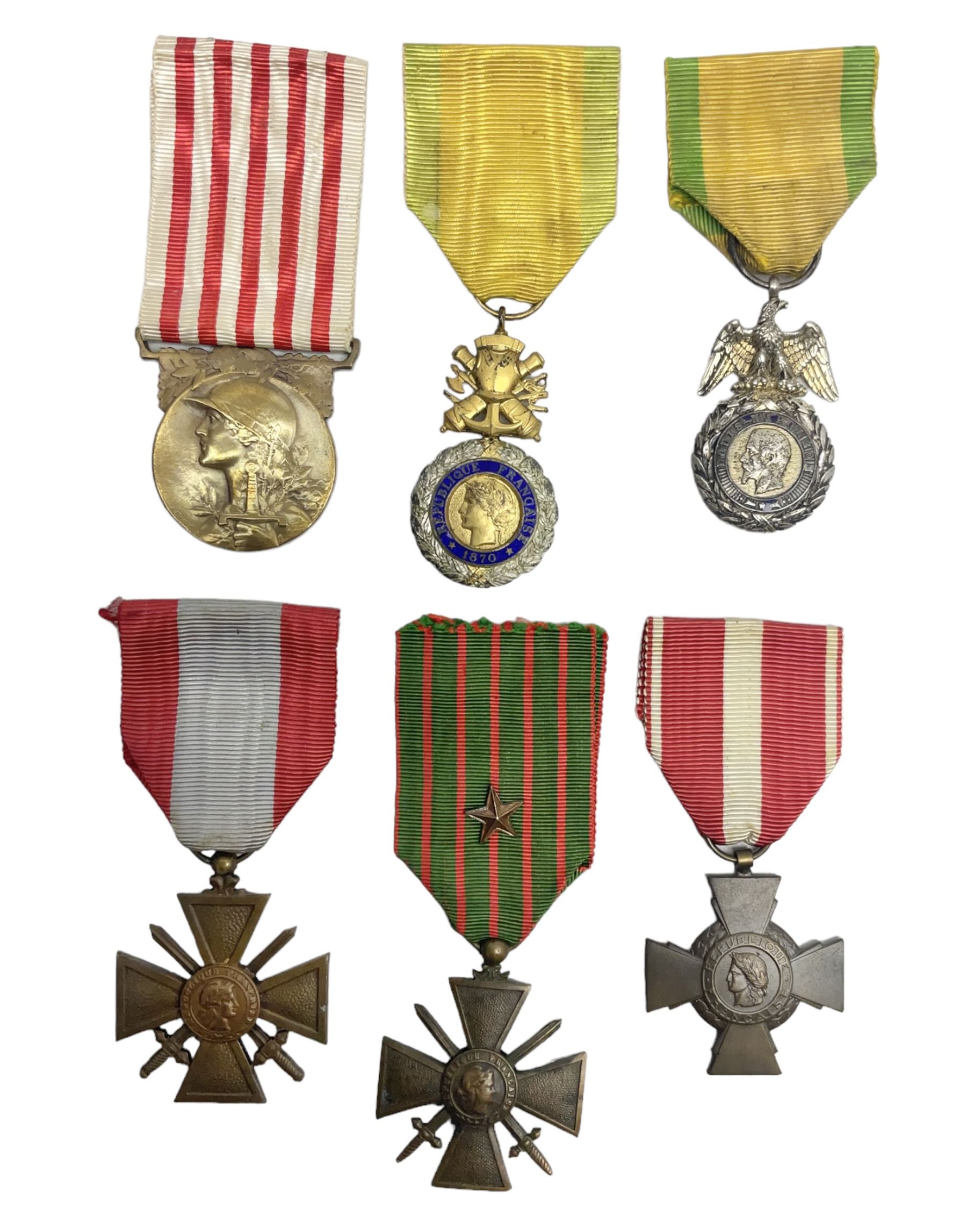 Six French medals - 2nd Empire Louis-Naploeon Medaille Militaire Valeur Et Discipline; 1870 3rd Republic Medaille Militaire Valeur Et Discipline; WW1 Croix-De-Guerre with MID star; WW2 Theatres D'Operations Exterieurs Croix-De-Guerre; WW1 Commemorative Medal; and Croix De La Valeur Militaire; all with ribbons (6)
