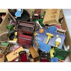Large quantity of 1970s doll's house furniture, predominantly stained or painted wooden, including lounge, dining room, kitchen and bedroom pieces, bathroom fittings, bureaux and desks, piano, lamps, fire-surrounds etc; various scales