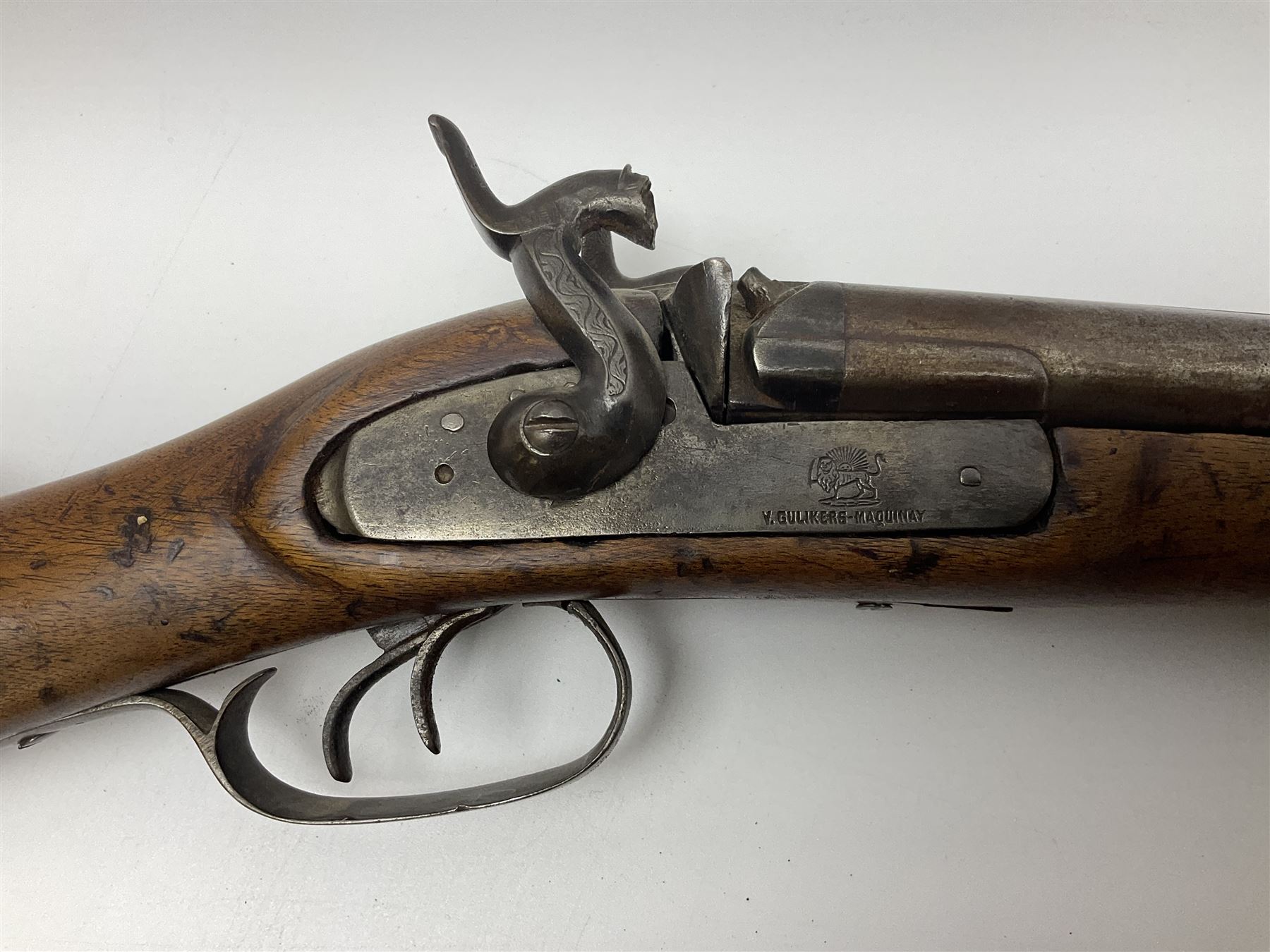 19th century Indian .577 Enfield muzzle loading rifle, proofed for 26-bore, the 98.5cm barrel with three barrel bands and later ram rod L140cm overall; 19th century Belgian side-by-side double barrel percussion shotgun, approximately 20-bore, with 74cm barrels and studded walnut stock, lock plate marked 'Liege 1868' and 'V. Gulikers-Maquinay' L117cm overall; and another side-by-side double barrel shotgun by Smythe with underlever opening (3)