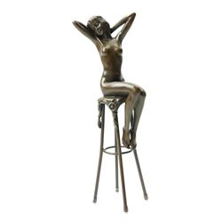 After D H Chiparus, an Art Deco style bronze modelled as a nude female figure seated upon ...
