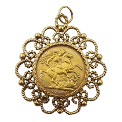 1915 gold full sovereign, loose mounted in gold openwork pendant, stamped 9.375, approx 13.87gm