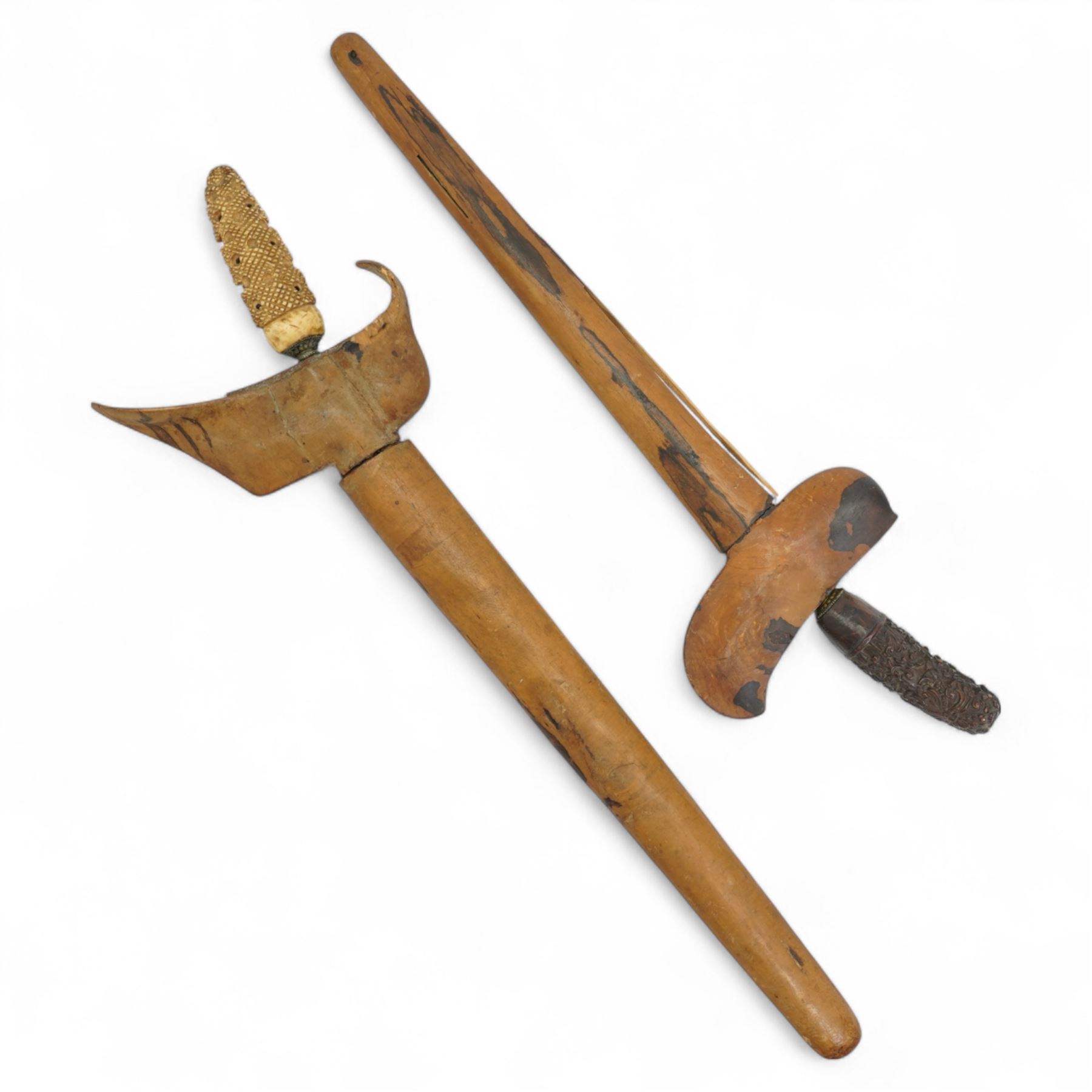  Malayan Kris with carved bone handle and engraved blade and one other (2)