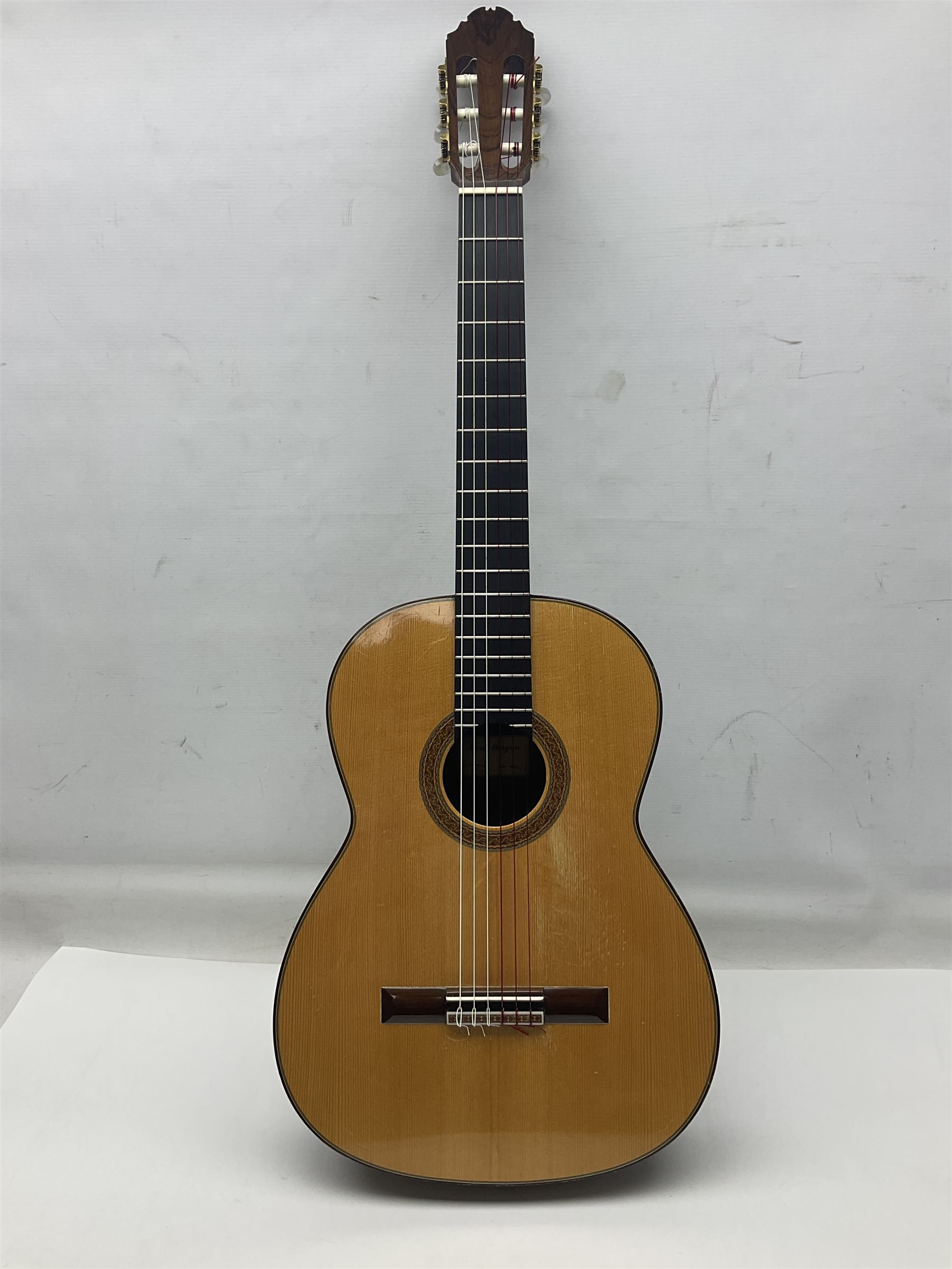 British hand made classical acoustic guitar by Huw Morgan with Indian rosewood back and sides and spruce top; bears label dated May 1998; L100cm; in Tribal Planet lightweight carrying case