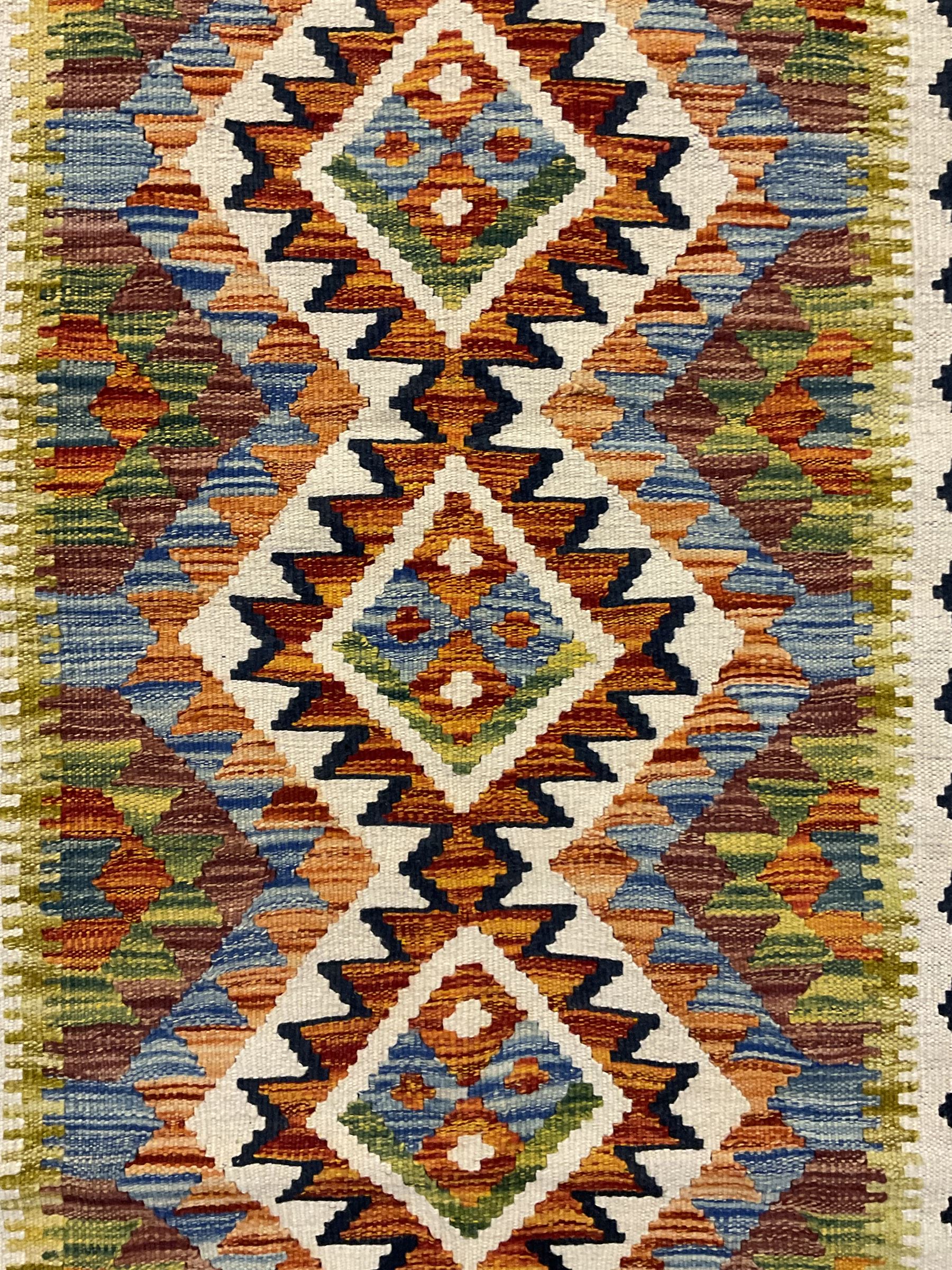 Chobi Kilim runner, geometric design decorated with six lozenges, multi-coloured ground