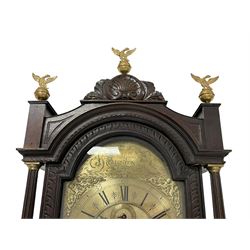18th-century profusely carved oak longcase clock - with a pagoda pediment, upstands and carving, 
 break arch hood door flanked by reeded pilasters with brass capitals, trunk with canted corners and a spire topped door, square plinth with applied skirting, break arch brass dial with wheatsheaf engraving and cast cherub and crown spandrels, engraved break arch with the London clockmakers name John Gordin, silvered chapter ring with Roman numerals, five minute Arabic's, minute and quarter hour tracks, matted dial centre with ringed winding holes, square date aperture and seconds ring, dial pinned to a five pillar movement with inside countwheel striking, striking the hours on a cast bell. With weights and pendulum. John Gordin, is possibly a mis-spelling or phonetic spelling of John Gordon, of London, who worked from Ludgate Street in the parish of St. Gregory by St. Pauls. Apprenticed in 1689 and died in 1732 when his will was proven.
