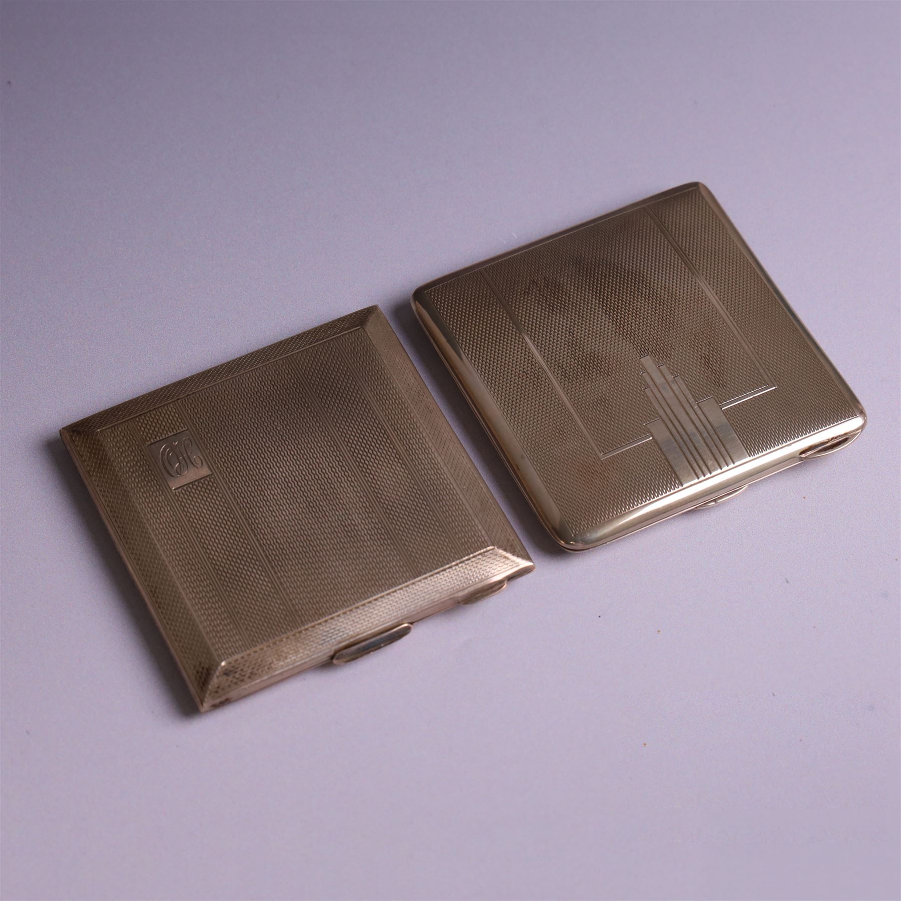 Two mid 20th century silver compacts, both rectangular with engine turned decoration, one with engraved monogram to cover, hallmarked Randle Brothers, Birmingham 1946, the other with personal engraving to interior, hallmarked William Suckling Ltd, Birmingham 1947, H7cm, both in fabric pouches