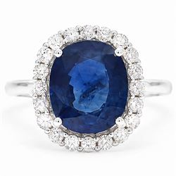 18ct white gold sapphire and diamond cluster ring, single cushion cut sapphire of approx 4...
