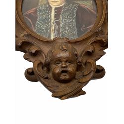 Portrait miniature of oval form H9cm, in a green Moroccan leather case with gilt edging, with a silk lining and velvet cushiob, together with a late 19th century miniature in a carved wooden frame, H20cm with frame. 