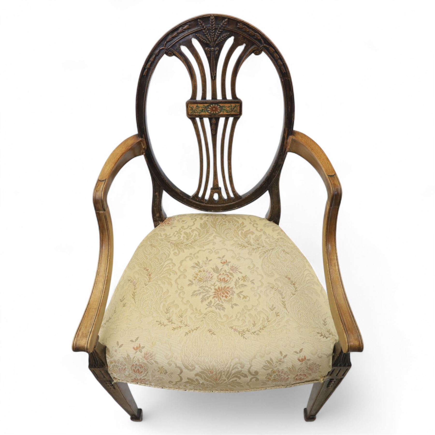 Edwardian painted open armchair, oval back with downswept arms, on carved tapered supports terminating in spade feet