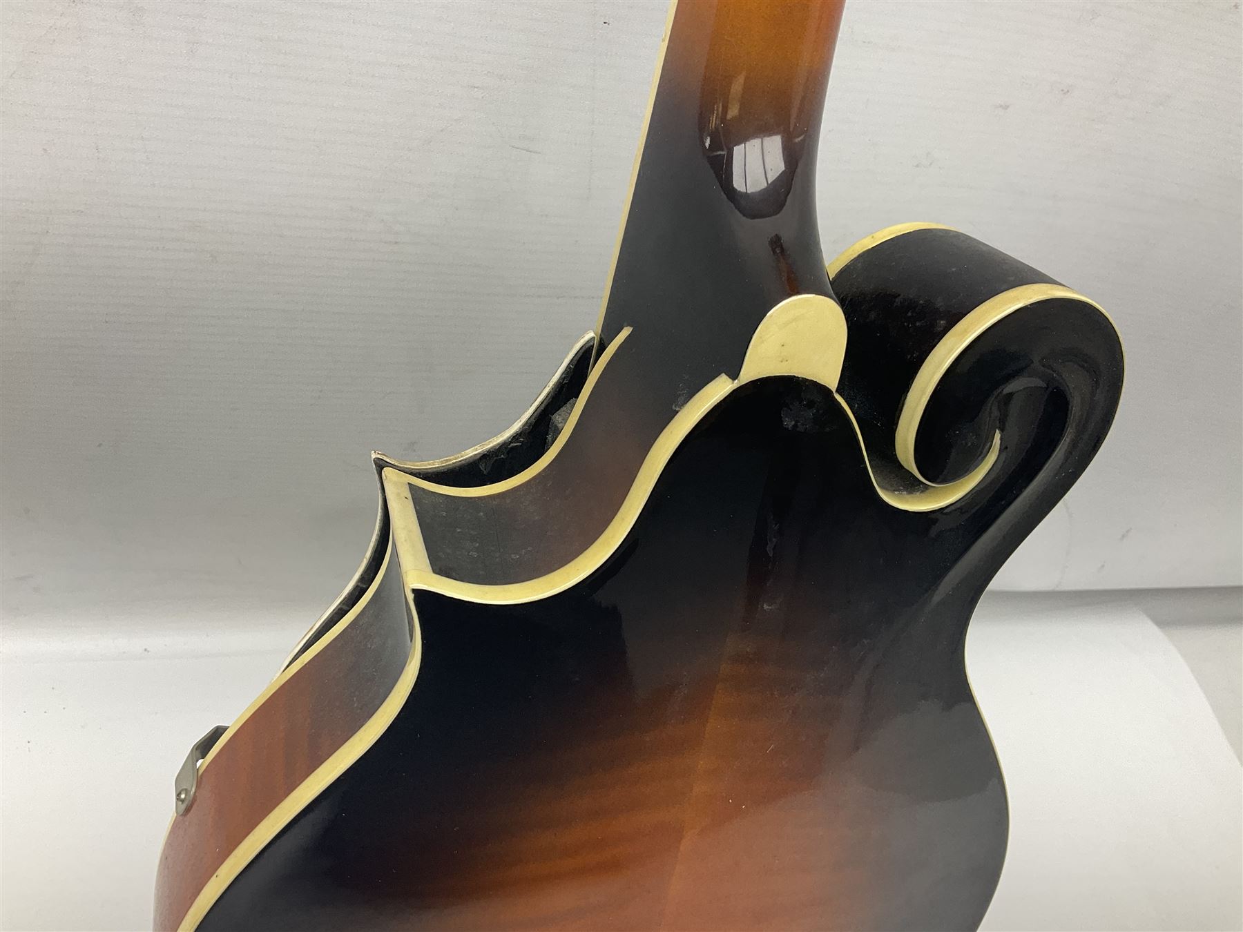Ashbury F-Model eight-string mandolin, model no.IMF-150 with two-piece maple back and ribs and sunburst top, mother-of-pearl inlay; bears maker's label; L69cm