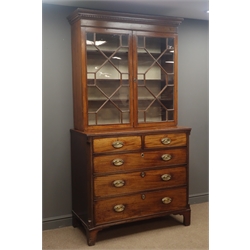  19th century mahogany bookcase on chest, projecting cornice, dentil frieze, astragal glazed doors enclosing three adjustable shelves above two short and three long drawers, bracket supports, W112cm, H214cm, D55cm - later bookcase  