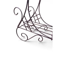 Mid-20th century wirework garden planter, oval form with heart shaped centre, under-tier shelf above scrolling feet