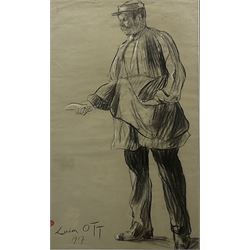 Lucien Ott (French 1870-1917): Portrait of a Postman, charcoal heightened in white with artist's studio stamp signed and dated 1917, 58cm x 35cm