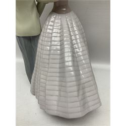 Lladro figure, An Evening Out, modelled as a man and women in evening dress, no 5540, year issued 1988, year retired 1991, H32cm