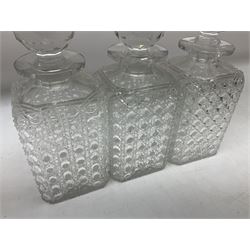 Set of three 19th century hobnail cut glass decanters with stoppers, together with a 19th century goblet with engraved decoration, tallest H24cm