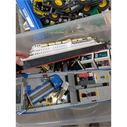 Two boxes of partially built Lego vehicles, including Lego Technics Dumper Truck no. 8264, Titanic, container ships, police boat, smaller police vehicles, etc