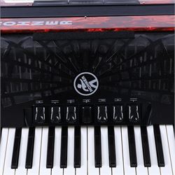 Hohner Bravo III accordion, with 96 bass buttons, pearlescent red case, with Hohner soft carry case and a Microvox microphone