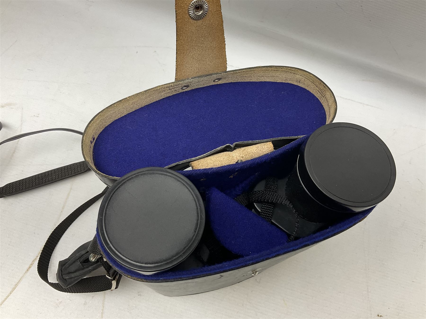 Olympus OM10 35mm camera, cased; pair of USSR 7 x 50 binoculars; cased; and pair of Le Jockey Club Paris binoculars