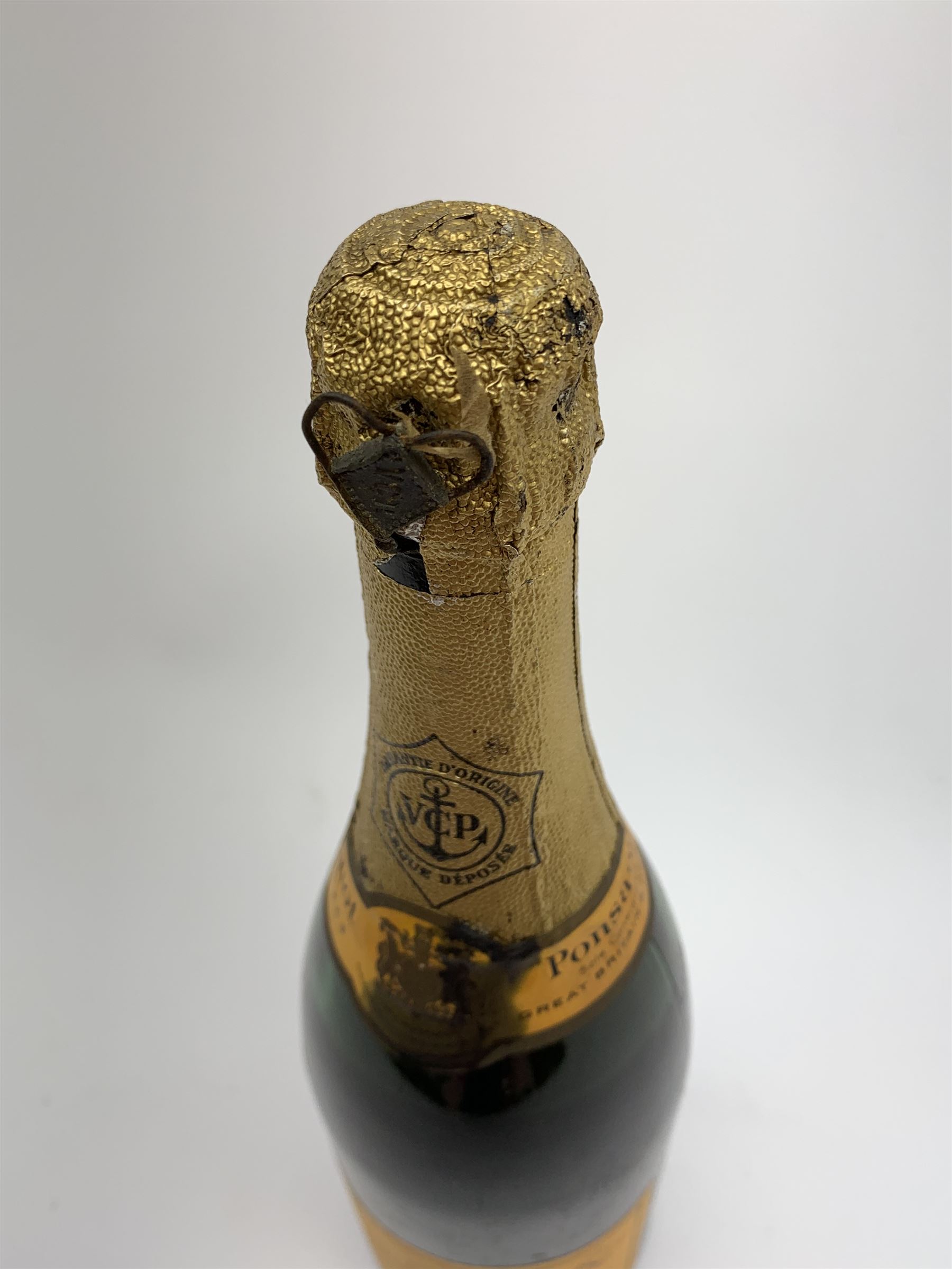 One bottle of Veuve Clicquot Ponsardin 1947 dry champagne, foil seal partially damaged, level below label