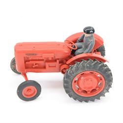 Pippin Toys Nuffield Tractor model, with red plastic body, rubber tyres and matched plastic farmer figure, in original box