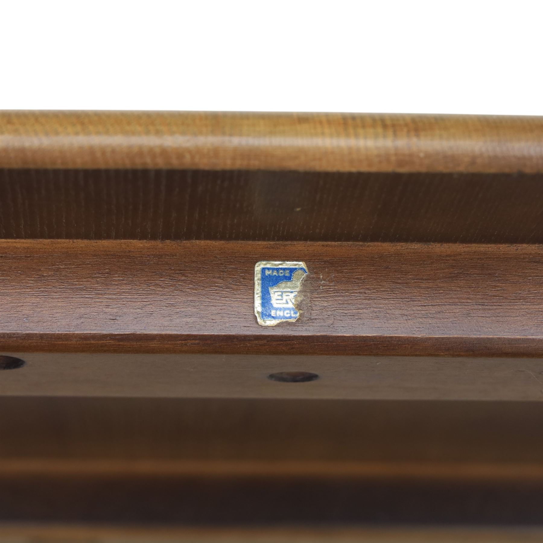 Ercol - Dark elm coffee table, plank top with chamfered edges, over a central under tier spindles, tapered legs 