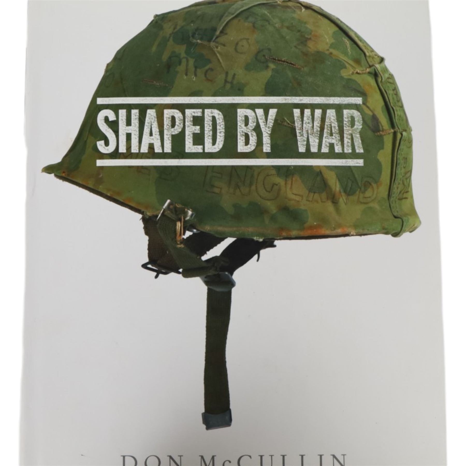 McCullin, Don: three hardback books, comprising 'Shaped by War', 'Hearts of Darkness' and a self titled example, together with a framed Times magazine cover depicting the photographer in black and white, signed to the left hand side