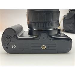 Four camera bodies, to include, Ricoh KR-10 serial no. 38826, Pentax MZ-M serial no. 4185969 with 'SMC Pentax- M 1:3.5 28mm' lens, Canon EOS500 serial no. 080927, with 'Sigma Zoom 100-300mm 1:4.5-6.7 DL'  lens etc, with other camera lenses and equipment 