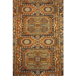  Persian red ground runner rug, six repeating medallions, 69cm x 240cm  