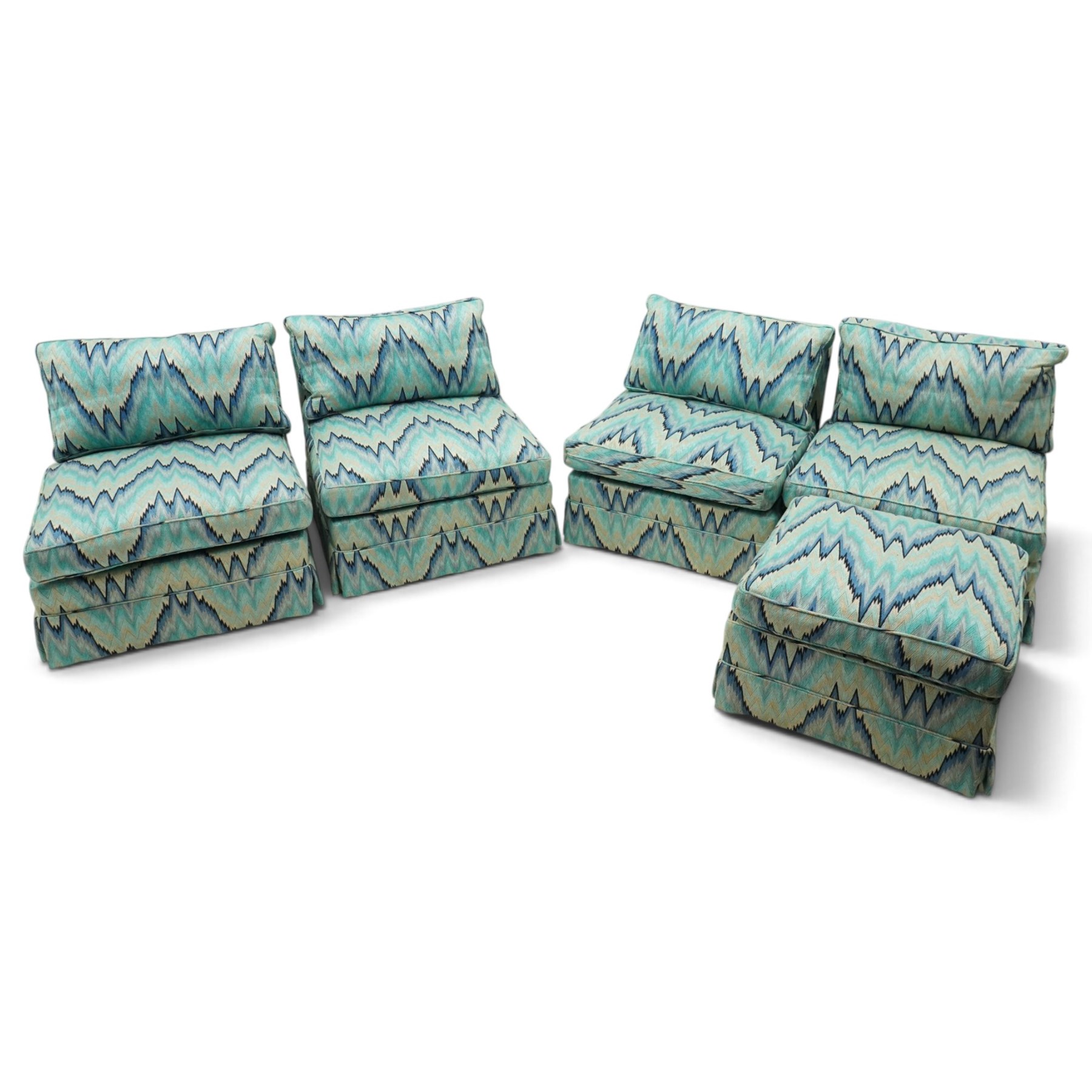 Parker & Farr - 1970s modular sofa suite comprising four chairs and footstool, reclined back with loose seat cushion, upholstered in turquoise flame-stich fabric with skirt, on castors