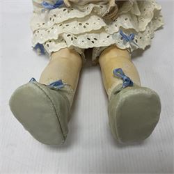 Simon & Halbig bisque head doll with applied hair, sleeping eyes, open mouth with upper teeth and jointed limbs; marked Simon & Halbig S&H 8 1/2, H58cm