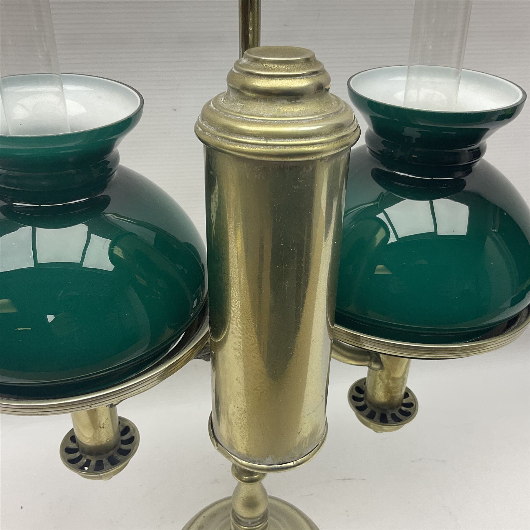 Miller & Sons Piccadilly polished brass double adjustable student's oil lamp, with green glass shades, H52cm