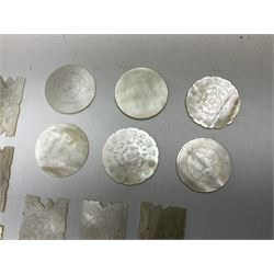 Collection of fifty two Chinese mother of pearl gaming counters or tokens, of various size and form including rectangular, circular and fish shaped examples, various decoration including floral motifs, largest rectangular examples L4cm