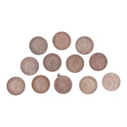 Twelve King George 1935 'Rocking Horse' silver one crown coins