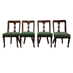 Set of four Victorian mahogany spoon back dining chairs, upholstered seats