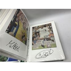 Collection of approximately 200 Leeds United related autographs, predominantly signed newspaper cuttings, contained within ring binder, together with a number of loose examples