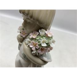 Three Lladro figures comprising, Pocket Full of Wishes no 7650, School Days no 7604 and Spring Bouquets no 7603, all with original boxes, largest example H26cm  